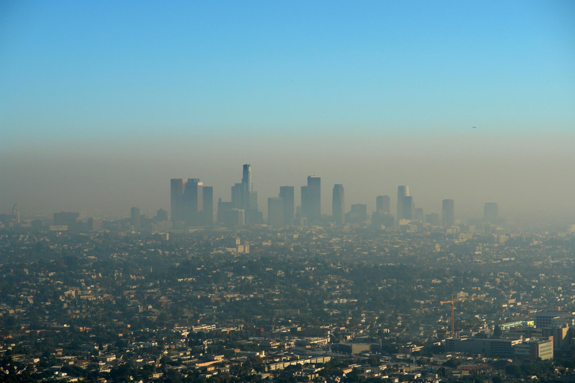 Air pollution haze over a city skyline